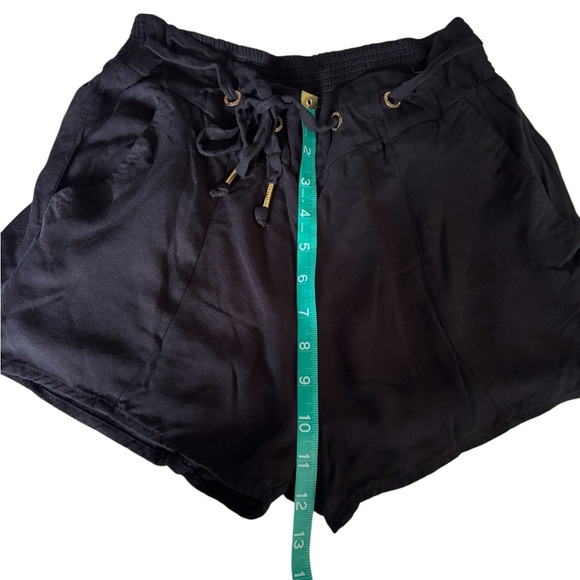 Bebe Black Women's High waisted shorts with Gold Grommet design. Size Small - Picture 6 of 12